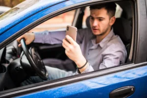 Hit by a Distracted Driver Proving Fault After a Texting Accident